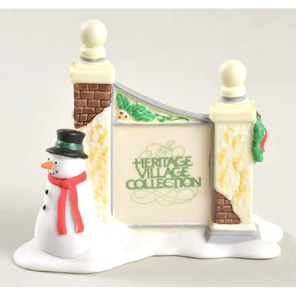 DEPT 56 THE HERITAGE VILLAGE COLLECTION VILLAGE SIGN WITH SNOWMAN - RETIRED